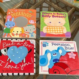 Set of 4 peek a boo baby board books in
